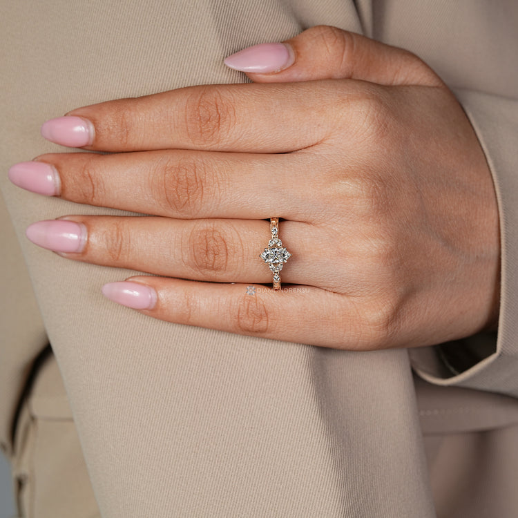 Marquise engagement ring with seven stone style and tulip setting.