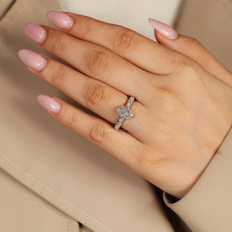 IGI certified Dutch marquise ring with round and marquise accents.