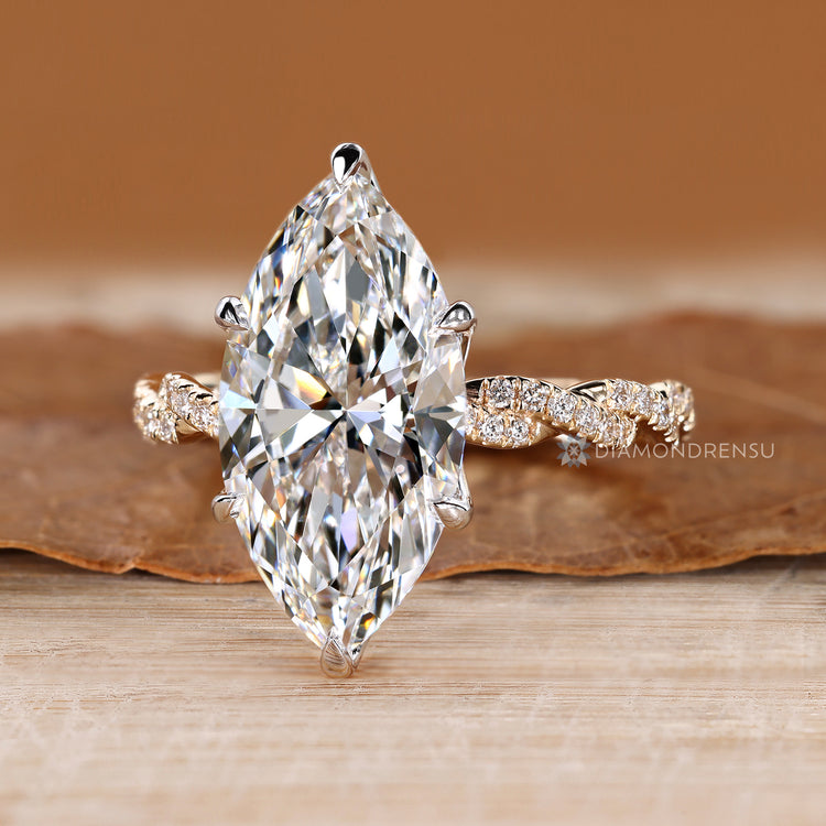 Lab grown diamond completes this handmade ring.
