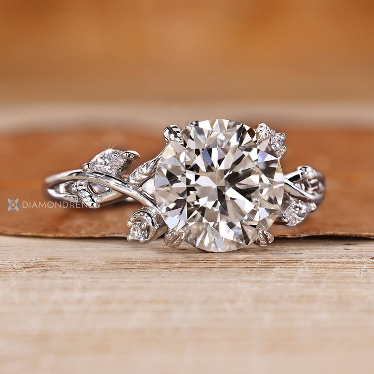 Four leaf style prong setting on a nature inspired engagement ring.