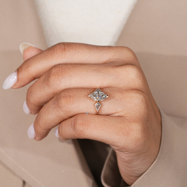 Dutch marquise diamond ring with a two claw prong setting.