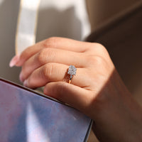IGI certified two stone ring with claw prong setting.