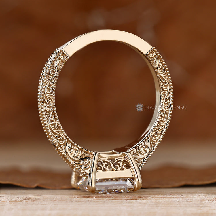 Princess cut Art Deco ring with a tapered shank.
