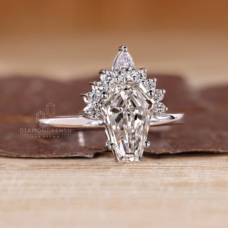 IGI certified coffin shaped diamond ring with half halo style.