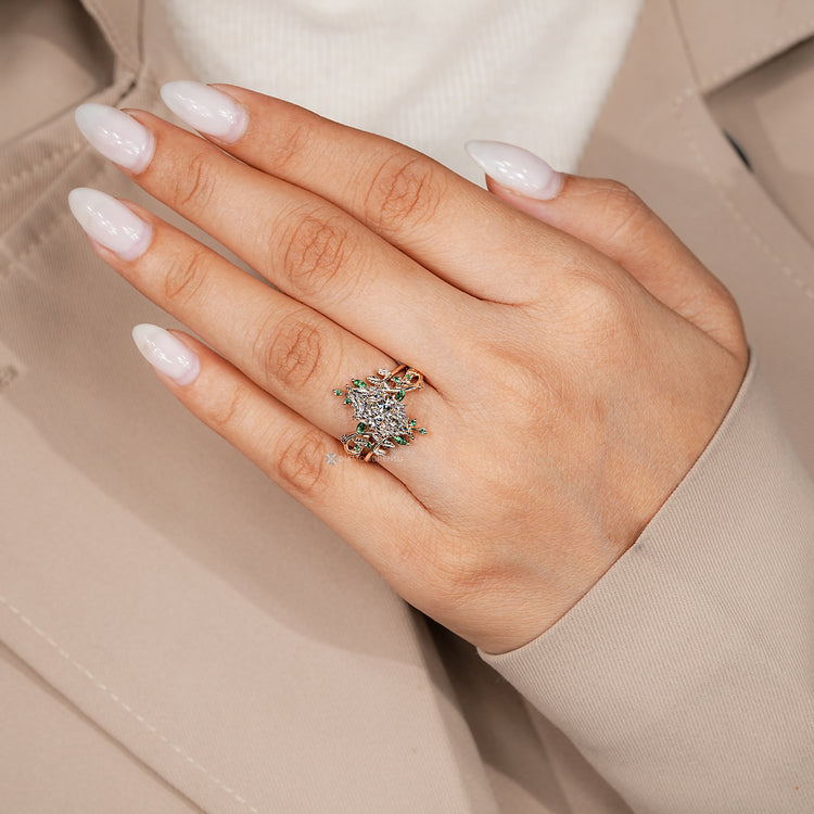 Dutch marquise center stone with a botanical vine band.
