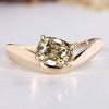 Cushion old mine cut ring in light yellow with solitaire style.
