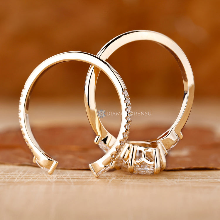 Lab grown diamond completes this handmade marquise ring wedding band.