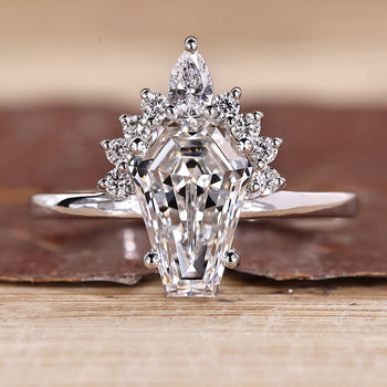 Coffin shaped engagement ring with vintage style and half halo design.