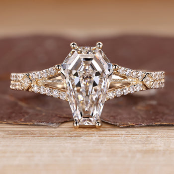 Double row pave diamond ring with coffin center stone and split shank.