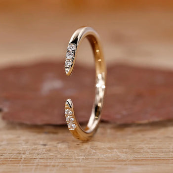 Open gap wedding band with a modern and stylish design.
