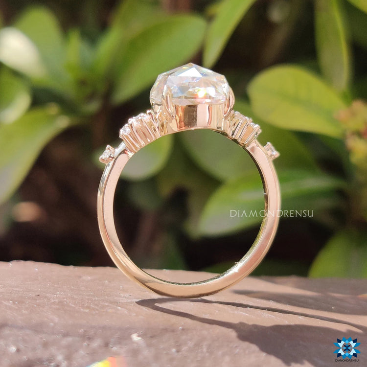 Diamondrensu engagement ring with yellow gold and rose cut style.
