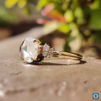 Yellow gold engagement ring made with handmade craftsmanship.
