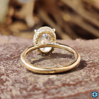 White and yellow gold two-tone moissanite ring.