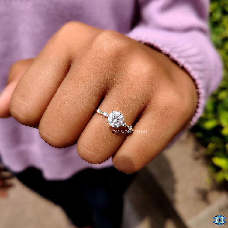 Yellow gold engagement ring radiates warmth.
