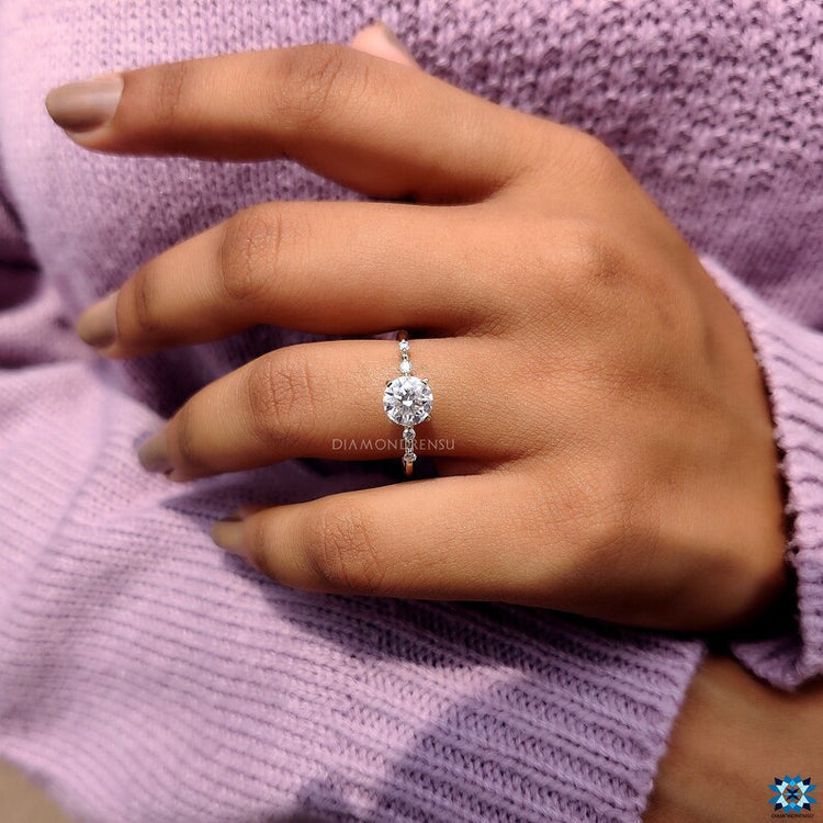 4 prong setting securely holds center stone.
