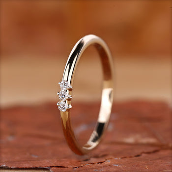 3 Stone Wedding Band with sparkling diamond accents.
