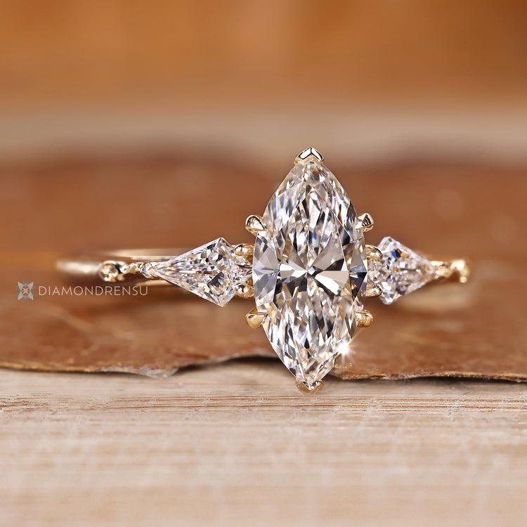 Tapered shank paired with two V prong setting.