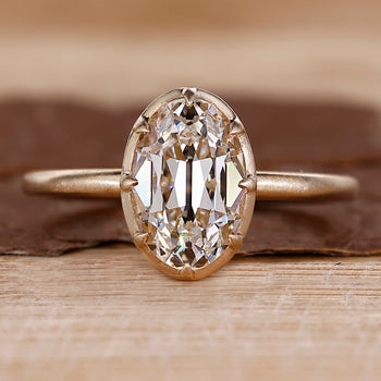 Old European cut diamond ring in yellow gold solitaire setting.
