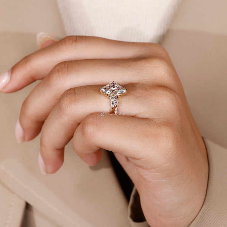 The marquise and round cut band pairs with the open gap wedding band.