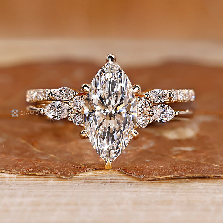 The tapered shank enhances this marquise ring wedding band.