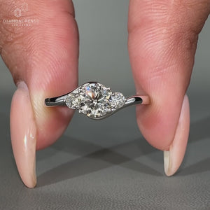 Elegant round diamond ring sparkling under natural light.
