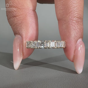 Princess cut wedding band in handmade yellow gold.
