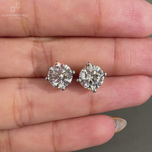 3 carat diamond earrings featuring round diamonds in stunning white gold jewelry design.
