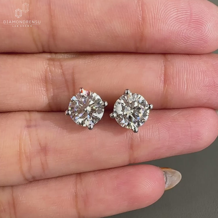 3 carat diamond earrings featuring round diamonds in stunning white gold jewelry design.
