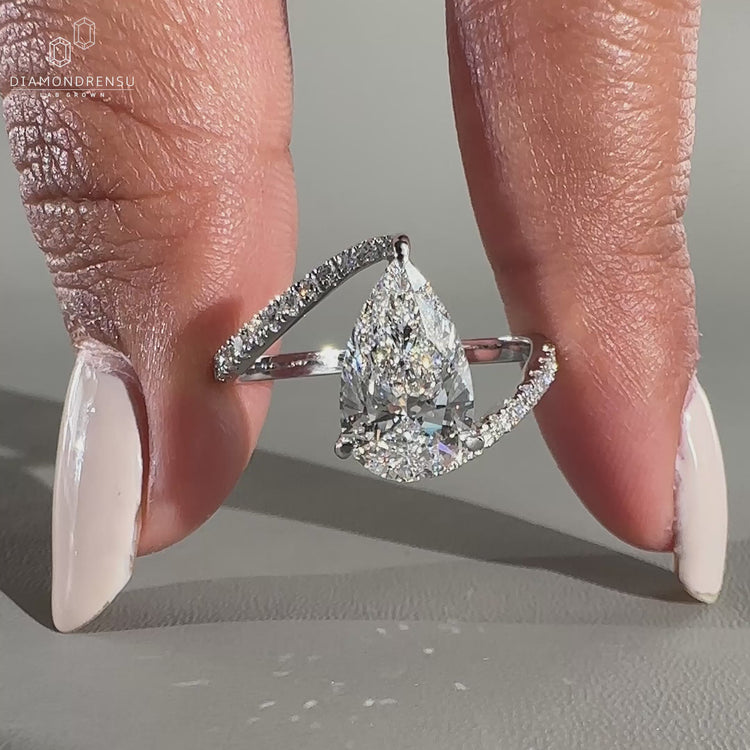 Pear Engagement Ring featuring a beautiful bypass setting.