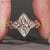 Lab grown marquise diamond ring with seven stone design.