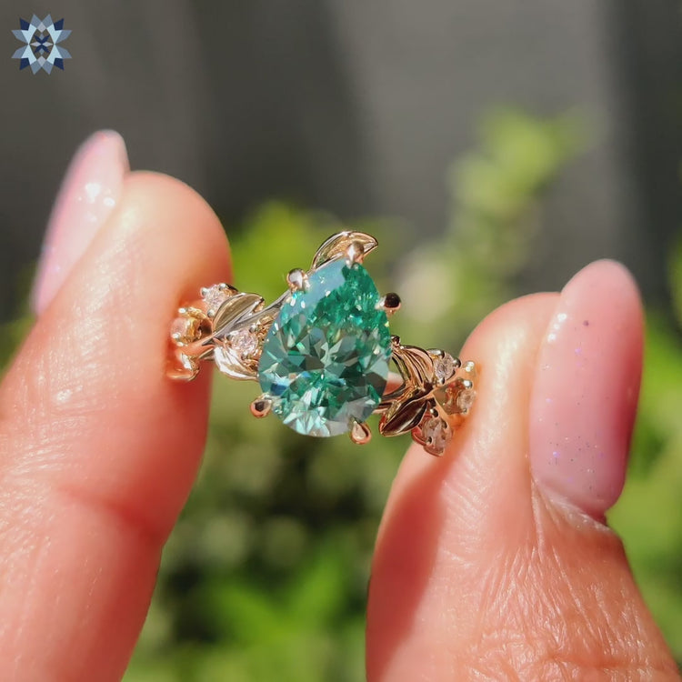 Pear cut moissanite ring, offering a dazzling shape and radiant brilliance, perfect for any occasion.
