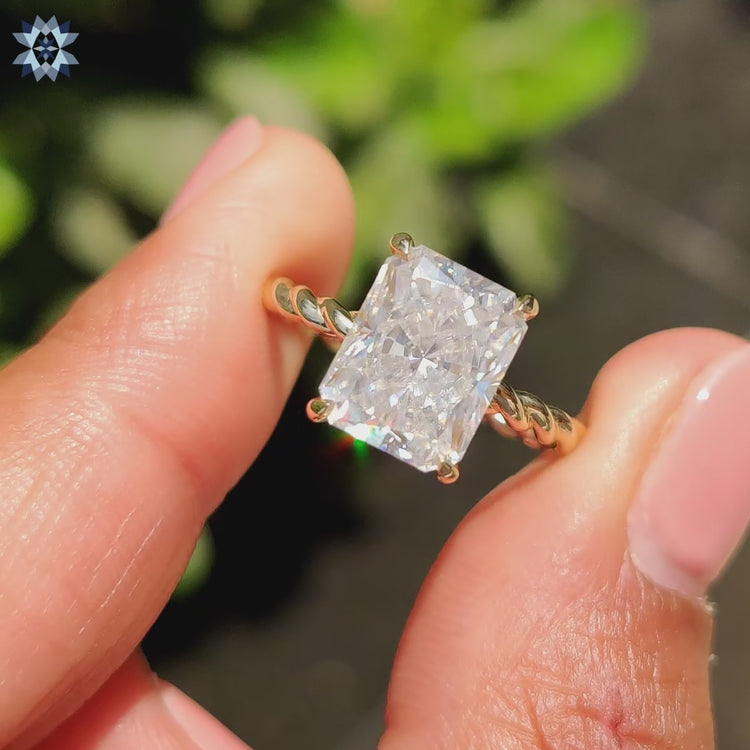 Hidden halo ring with round moissanite center.
