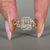 Lab grown radiant diamond ring with round diamond halo style.