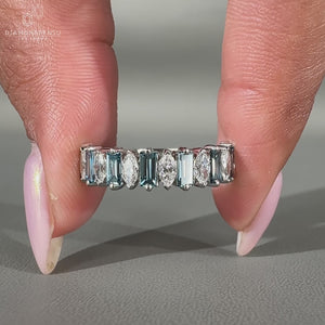 Marquise and Baguette Diamond set in a white gold diamond wedding band.
