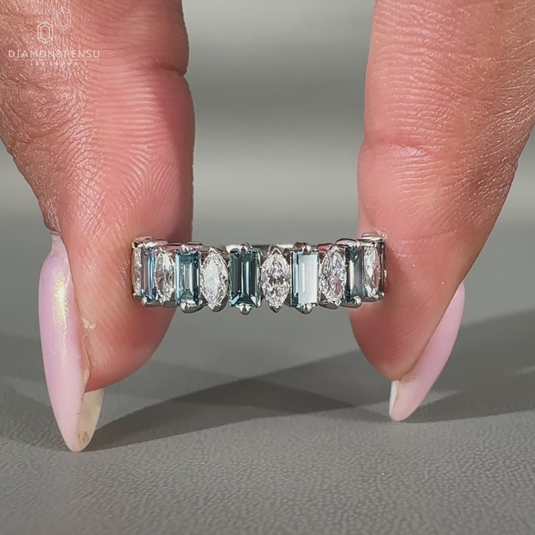 Marquise and Baguette Diamond set in a white gold diamond wedding band.
