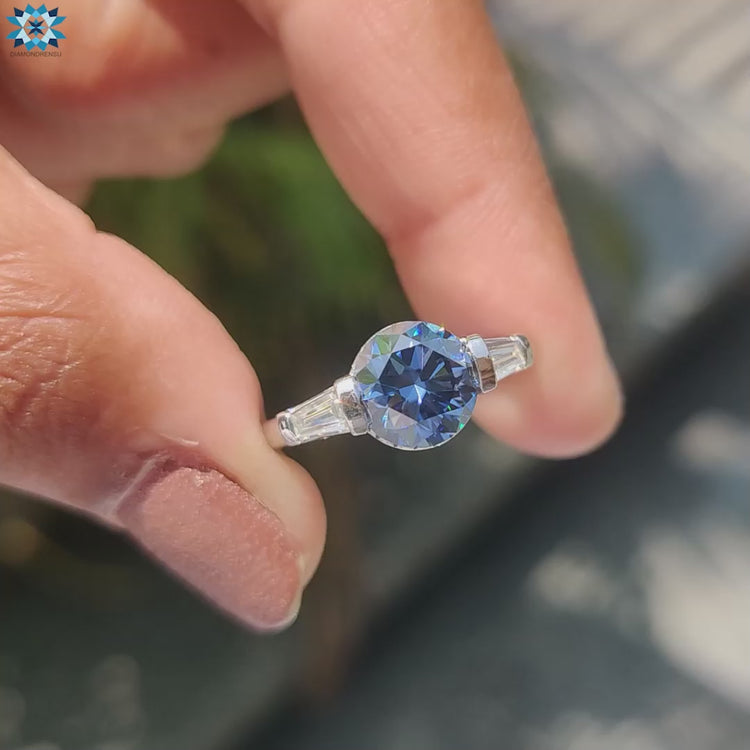 Round moissanite engagement ring with bar setting.