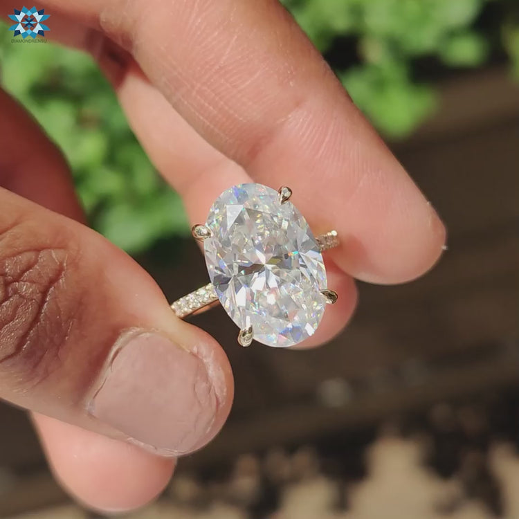 Hidden halo engagement ring crafted for a delicate hidden glow.
