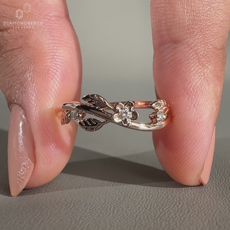 Nature inspired wedding band with lab grown diamonds.
