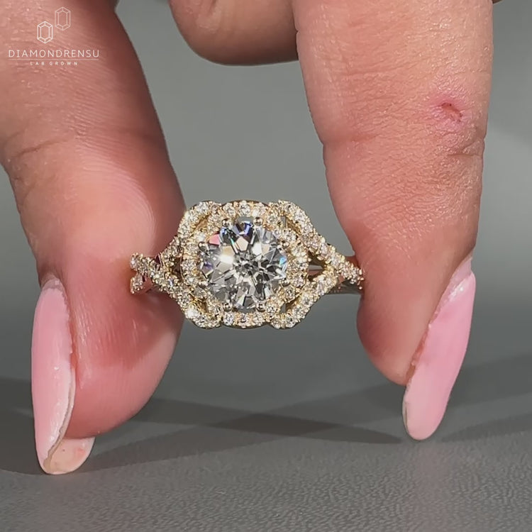 Antique vintage diamond ring with milgrain setting and round side stones.
