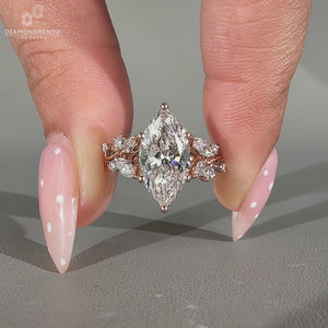 Lab grown marquise diamond ring with nature inspired design.