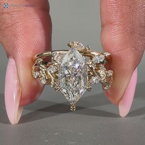 Diamondrensu bridal set with marquise and round diamonds.