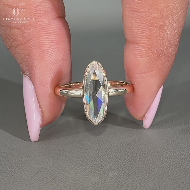 Double prong setting with solitaire engagement ring.
