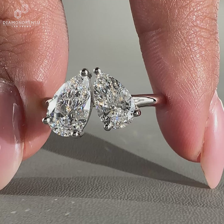 Toi et Moi Ring with a unique pear cut engagement ring design.
