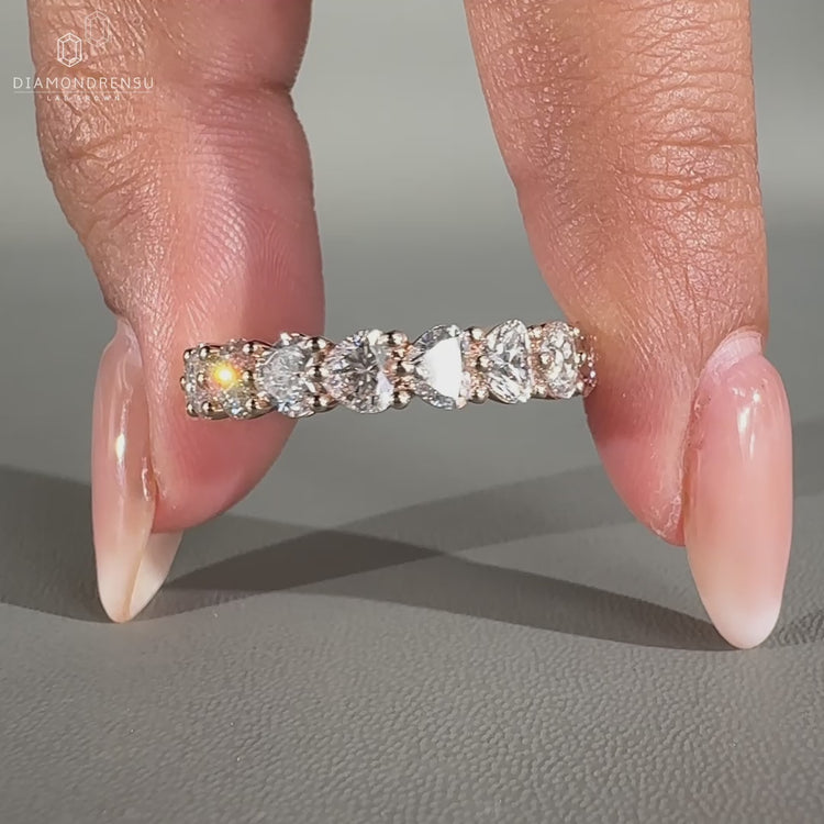 Stunning heart diamond wedding band featuring a romantic design for a timeless look.
