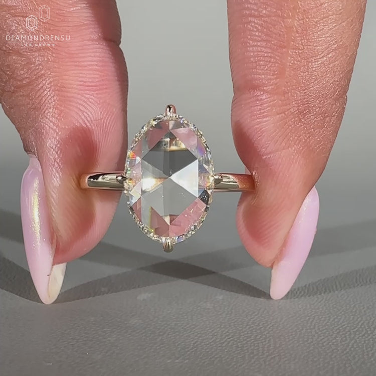 Handmade solitaire setting ring featuring an open gallery design.
