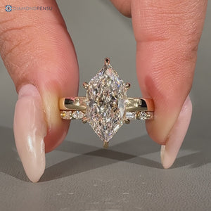Diamondrensu handmade Dutch marquise wedding ring with full eternity band.