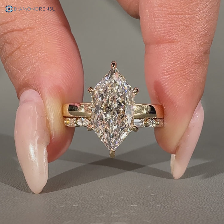 Diamondrensu handmade Dutch marquise wedding ring with full eternity band.