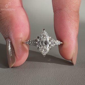 Marquise Engagement Ring featuring a beautiful white gold band.