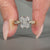 Round cut pave band engagement ring in two tone yellow and white gold.
