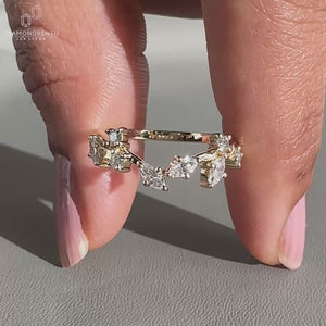 Model wearing a nature-inspired diamond wedding band with round and marquise diamonds